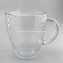Стеклянная чашка с прозрачным молотком и ручкой